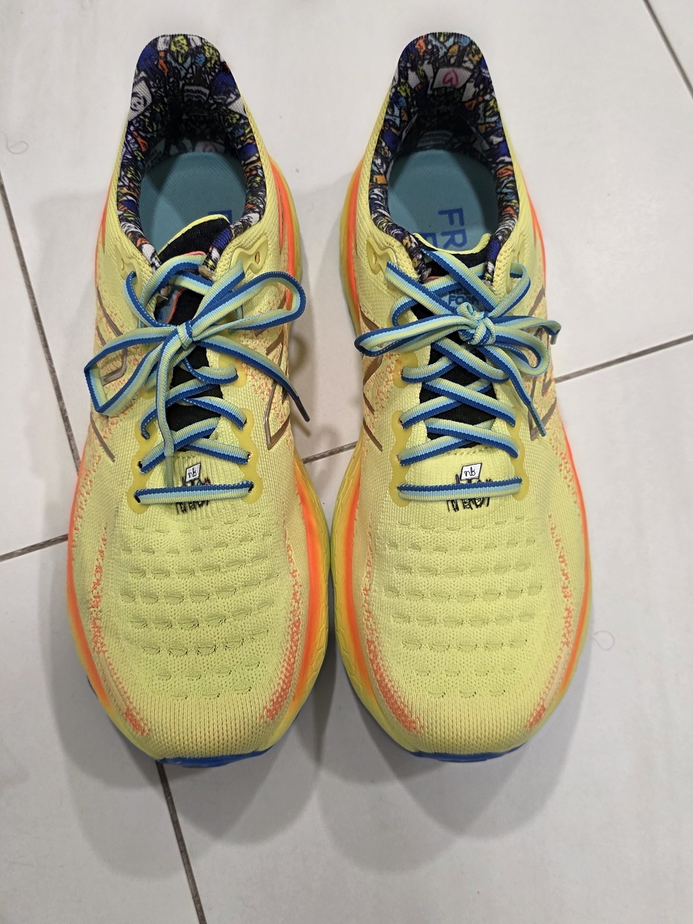 New Balance Yellow Athletic Running Shoes with Blue Accents